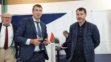 Сергей Серебряков — директор «Петербургского тракторного завода» (справа) и участники конференции СП «Прогресс»